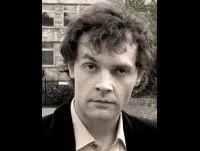 배우인 다리우스 구마우스카스의 대표 이미지