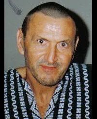 배우인 크르지스토프 마흐작의 대표 이미지