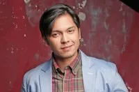 영화배우인 카를로 아퀴노의 대표 이미지