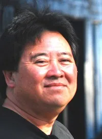 영화감독인 앨버트 퓬의 대표 이미지