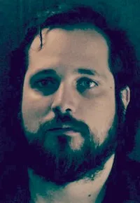 영화감독인 카를로스 베르뭇의 대표 이미지