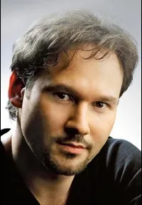 성악가인 마리우쉬 퀴볘첸의 대표 이미지