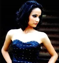 영화배우인 안드레아 타리앙의 대표 이미지