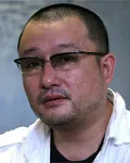 영화감독인 왕 샤오슈아이의 대표 이미지