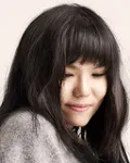 가수인 계피의 대표 이미지